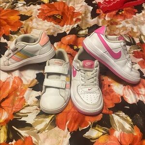 Nike Kids Sneakers with Pink and white and Adidas multicolor details.